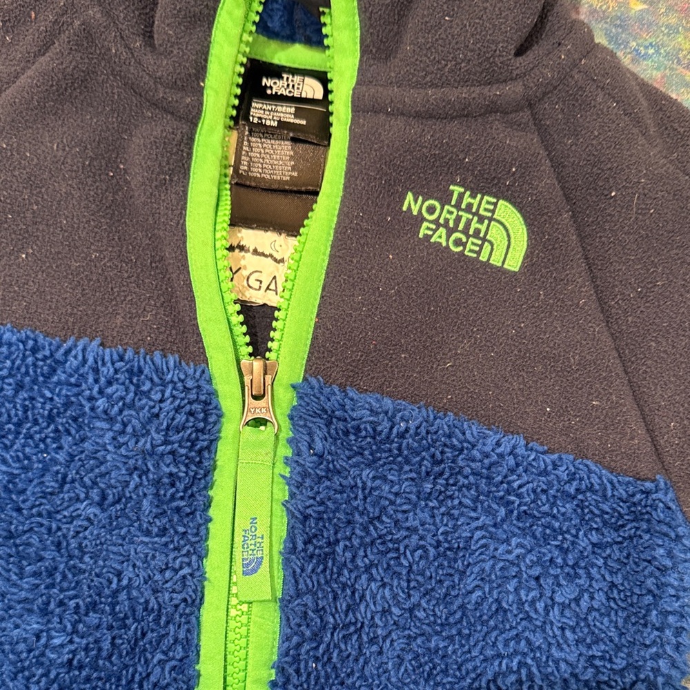 The North Face Navy, Blue, and Lime Fleece Baby Onesie